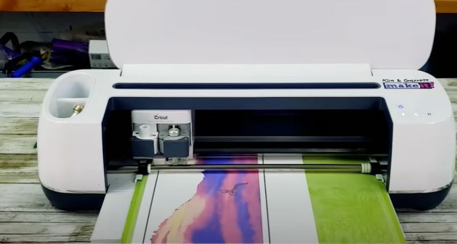 load the printed sublimation paper on the Cricut