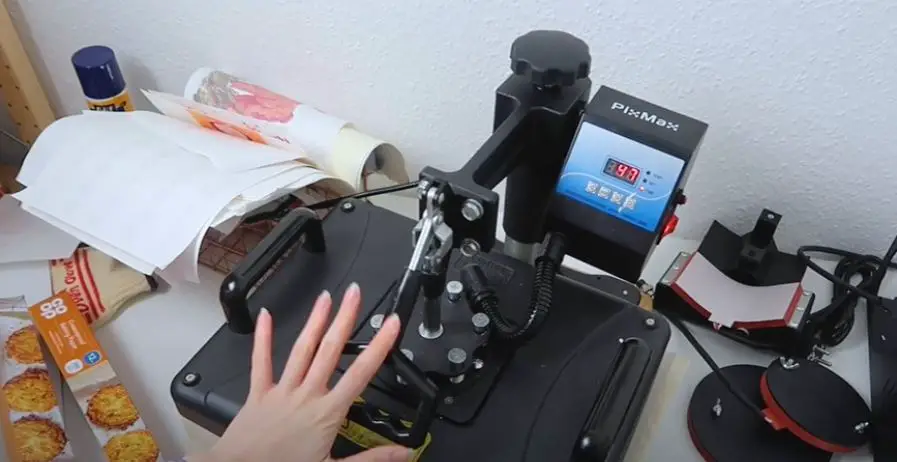 Using heat press to press sublimation paper